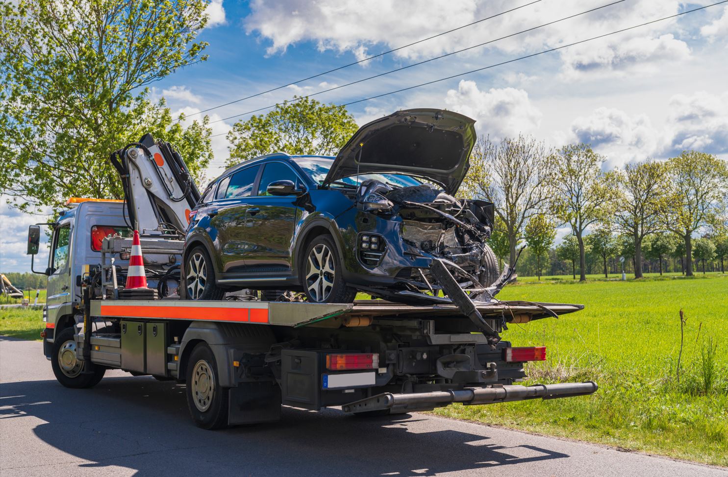 Skadet bil på autotransporter
